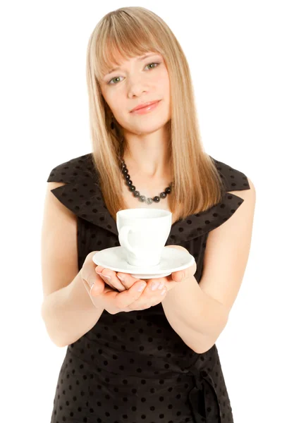 Beautiful woman holding white cup (focus on a cup) — Stock Photo, Image