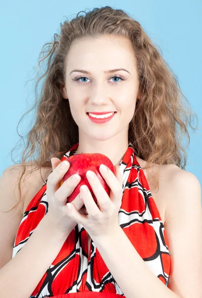 लड़की एक सेब पकड़े हुए — स्टॉक फ़ोटो, इमेज