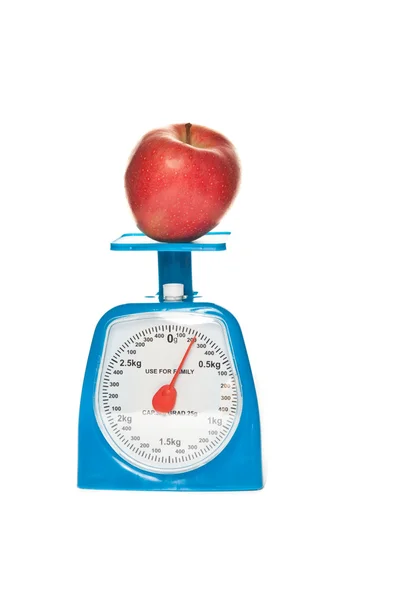 Scale and red apple — Stock Photo, Image