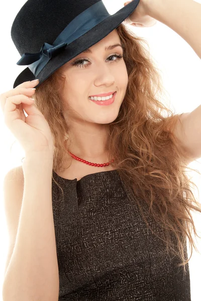 Woman with hat looking to the camera — Stock Photo, Image