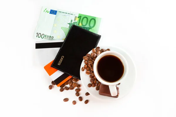 Filiżankę kawy, nasiona, cukierki i pieniądze — Zdjęcie stockowe
