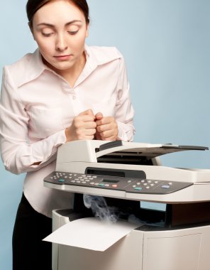 Surprised woman with smoking copier clipart