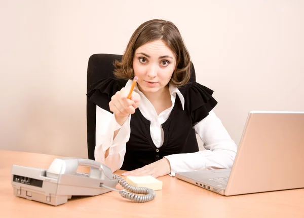 Young businesswoman working at the office — Stock Photo, Image