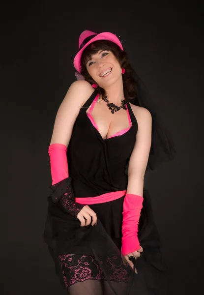 Foto de una joven con guantes y sombrero rosa — Foto de Stock