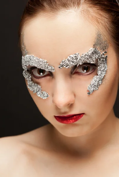 Woman in foil mask — Stock Photo, Image