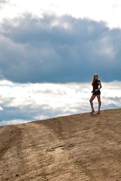 Stock image Woman on the road