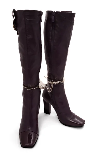 Chained boots — Stock Photo, Image
