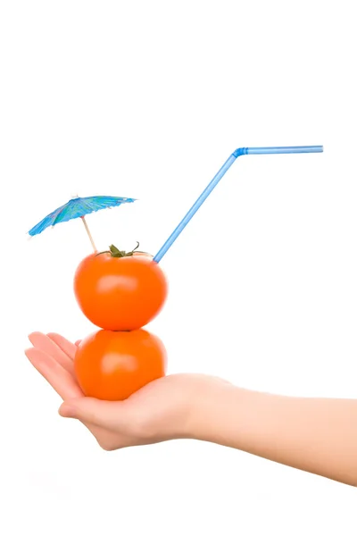 Dwa pomidory ze słomy i koktajl parasol — Zdjęcie stockowe