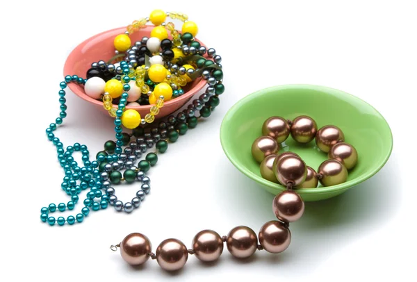 Make the choice between two plates with different beads — Stockfoto