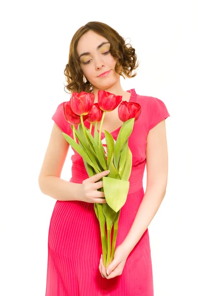 Beautiful young woman with tulips — Stock Photo, Image