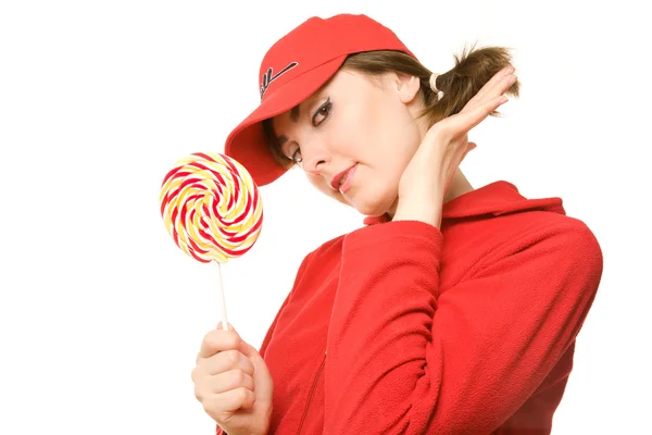 Vacker kvinna med lollipop leende — Stockfoto