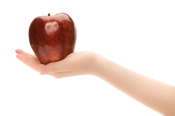 Frauenhand mit Apfel — Stockfoto