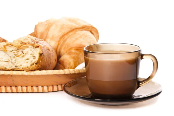 A cup of coffee and cornetto — Stock Photo, Image