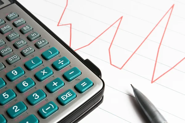 Calculator op de grafiek — Stockfoto