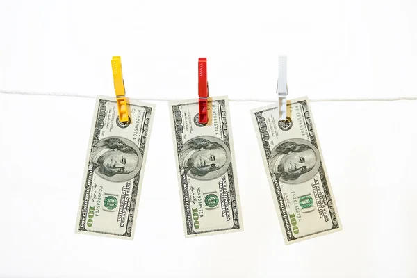 Money on clothespins — Stock Photo, Image