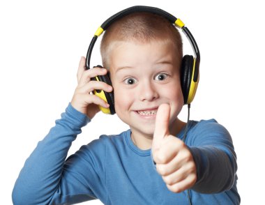 Young boy in headphones clipart