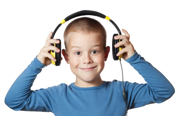 Niño en auriculares —  Fotos de Stock