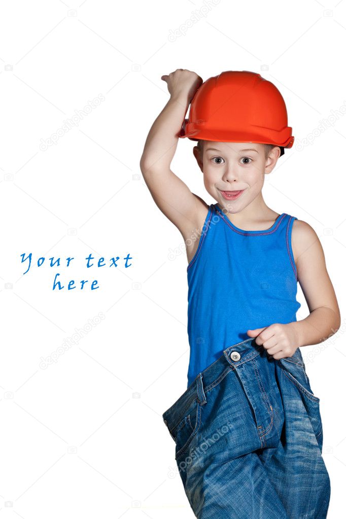 Little boy with hard hat and in too big jeans