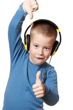 Young boy in headphones clipart