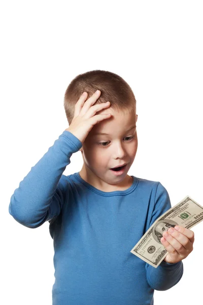 Küçük çocuk bir dolar tutan — Stok fotoğraf