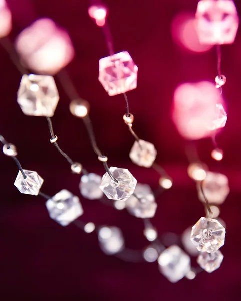 stock image Beads on cherry background