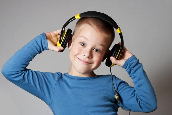 Young boy in headphones Stock Image