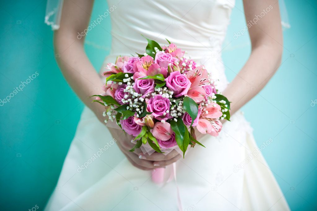 Bridal bouquet in the the bride's hands