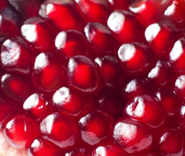 Background of red pomegranate seeds clipart