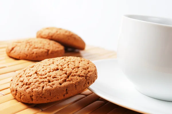 stock image Cup of coffee and oatmeal cookies