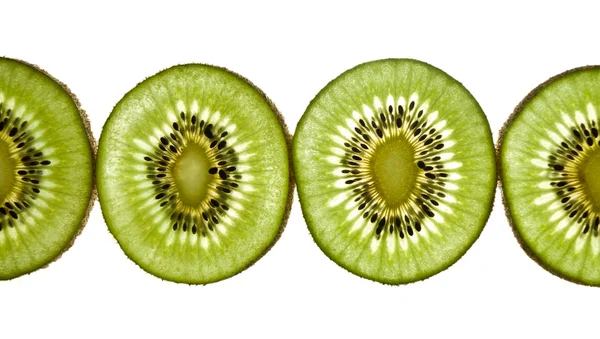 Close up van gesneden stukken van kiwi 's — Stockfoto