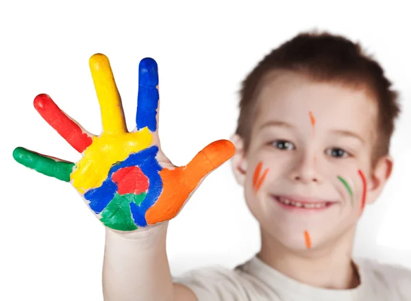 Criança mostrando suas mãos coloridas — Fotografia de Stock