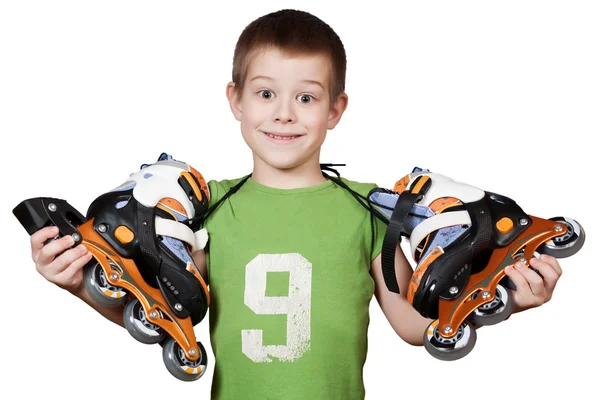 Little beautiful boy with roller skates — Stock Photo, Image