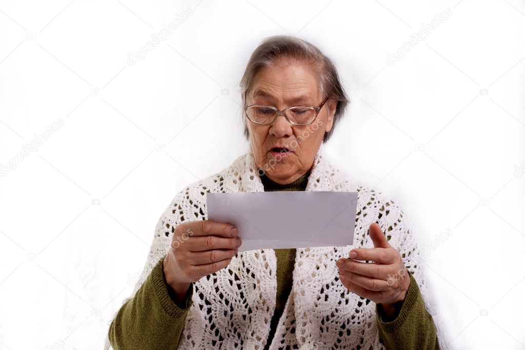 Senior woman with bills