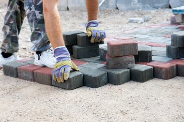 Brick paver working clipart