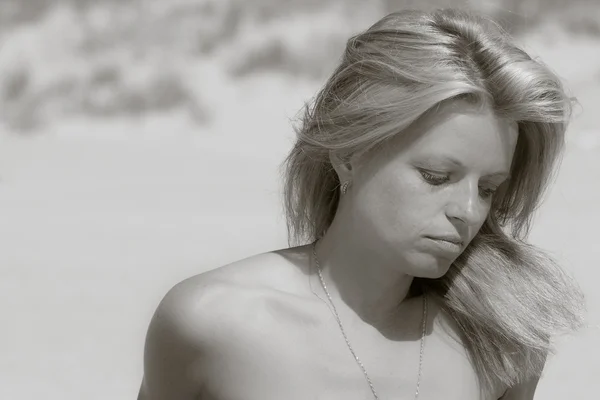 stock image Sadly woman at a beach