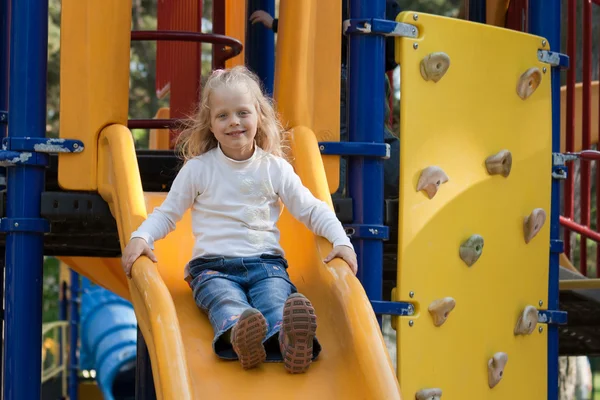 Girl On A Playground Slide — Stock Photo, Image