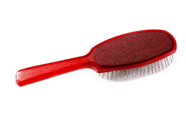 Escova de cabelo vermelho — Fotografia de Stock