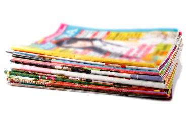 Stack of old colored magazines clipart