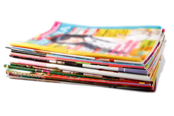 Pila di vecchie riviste colorate Immagini Stock Royalty Free