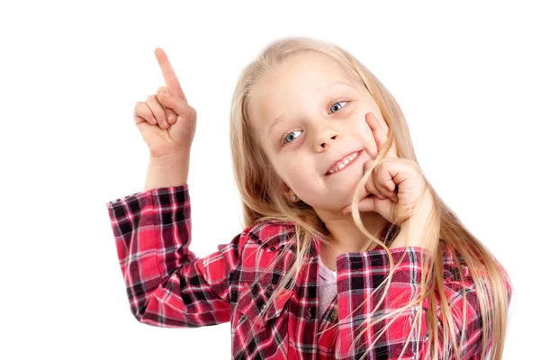 Smiling little girl pointing at something — Stock Photo, Image