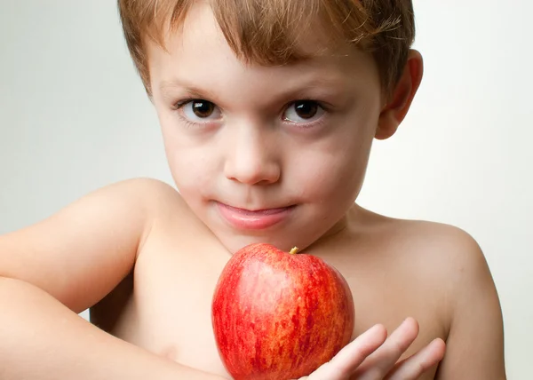 Хлопчик з яблуком Стокова Картинка