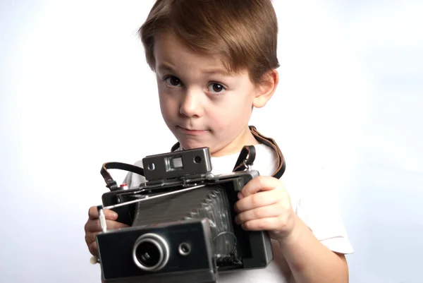 Niño cámara Insant —  Fotos de Stock