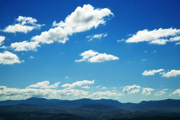 Clouds and blue sky background — Stock Photo, Image
