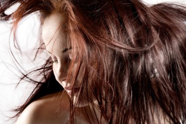 Red/brown hair billowing around clipart