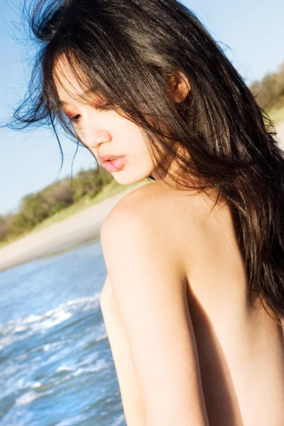 Asian model on beach — Stock Photo, Image