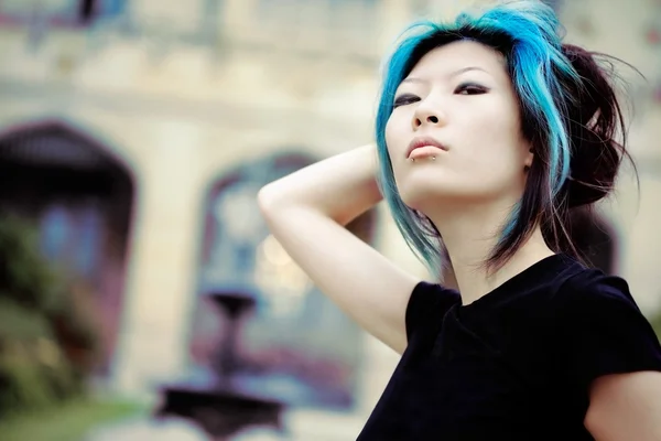 Asian model in front of old building — Stock Photo, Image