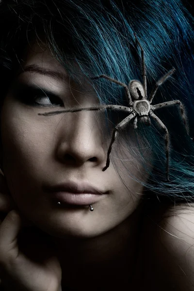 Portrait of model with spider in hair — Stock Photo, Image