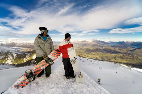 Praticantes de snowboard — Fotografia de Stock