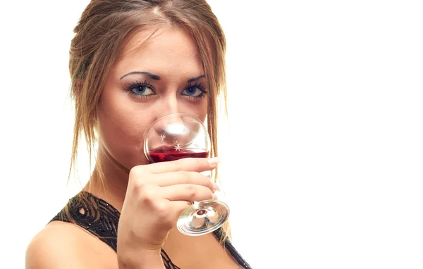 Flickan dricka ur ett glas — Stockfoto