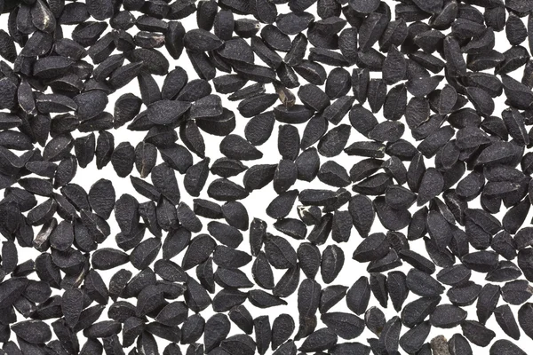 stock image Black Kalonji Seeds on White Macro